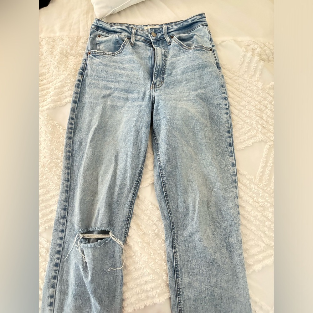 Copper key ripped jeans